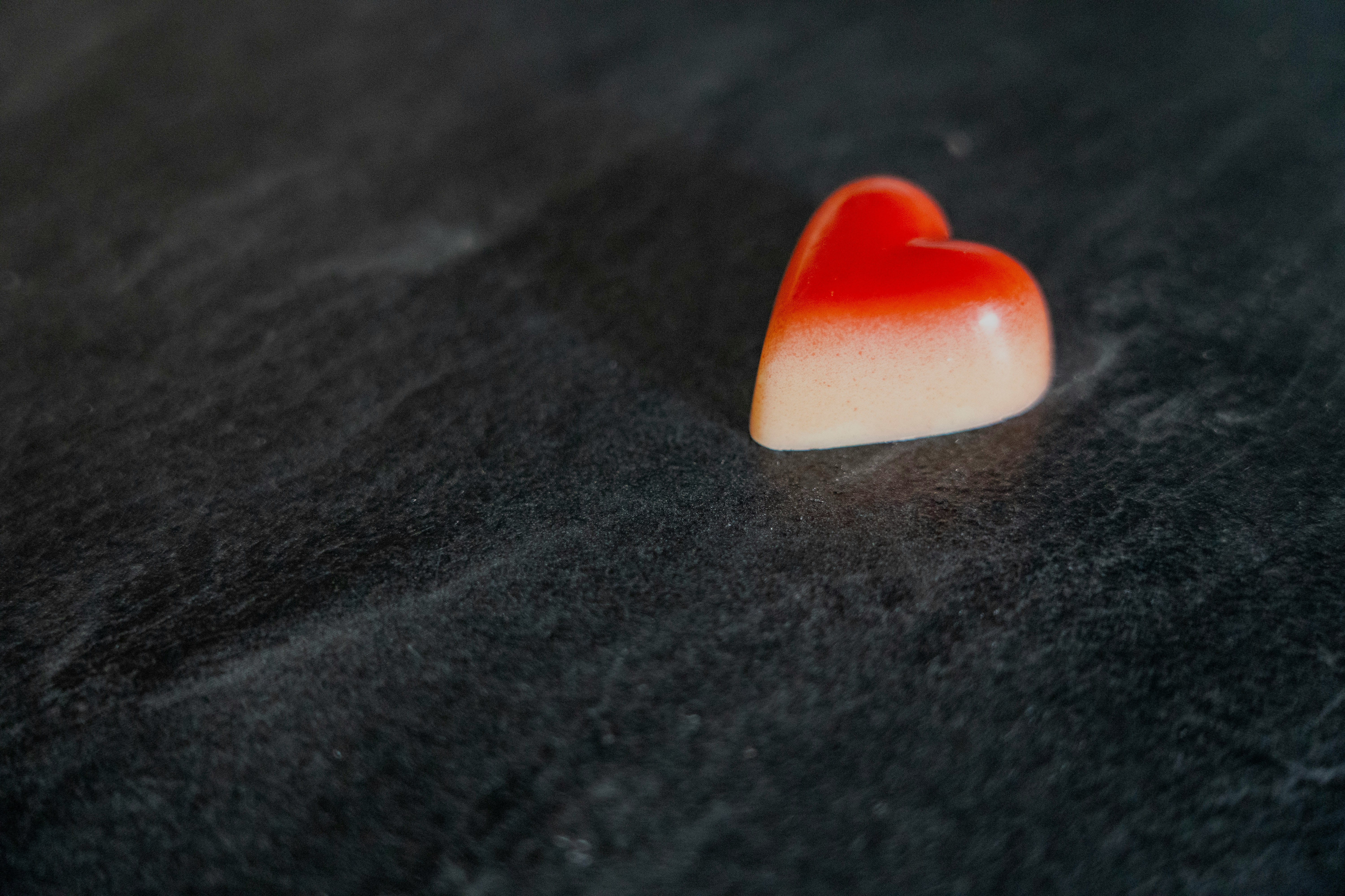 white and orange heart shaped ornament
